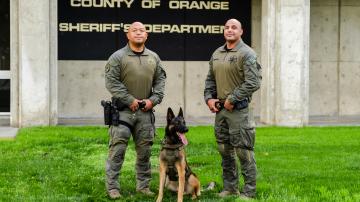 From left: Deputy Nauta, K-9 Rocky, and Sgt. Cruz 