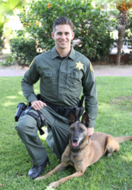 Orange County officer Austin and narcotic K-9 Luna