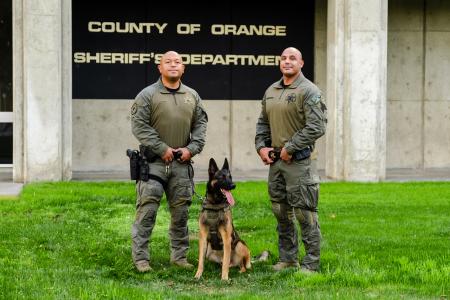 From left: Deputy Nauta, K-9 Rocky, and Sgt. Cruz